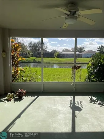 a view of a street with an outdoor seating