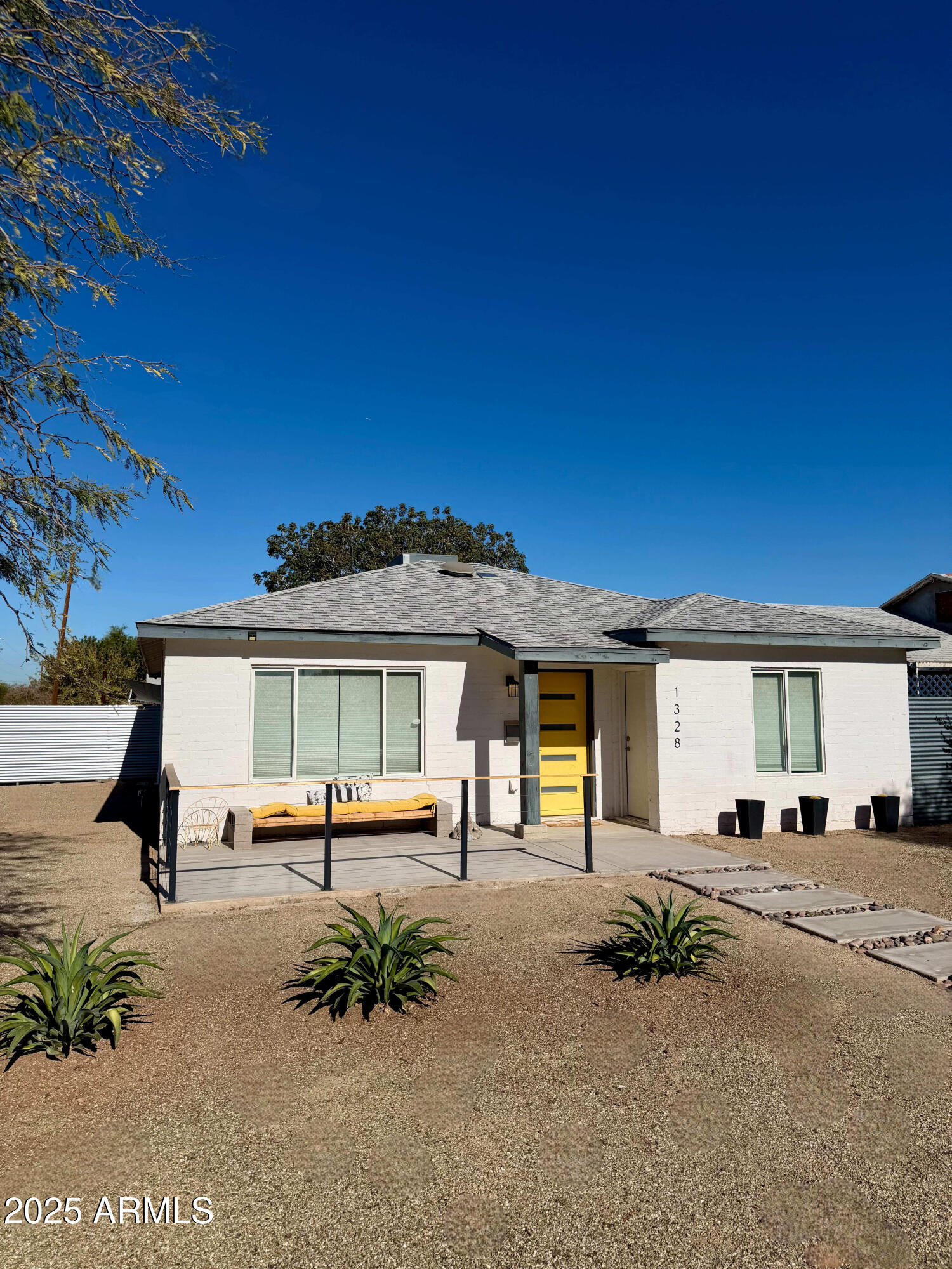 1328 East Weldon Avenue Phoenix, AZ 85014 - Photo 1 of 1 a view of a house with a backyard