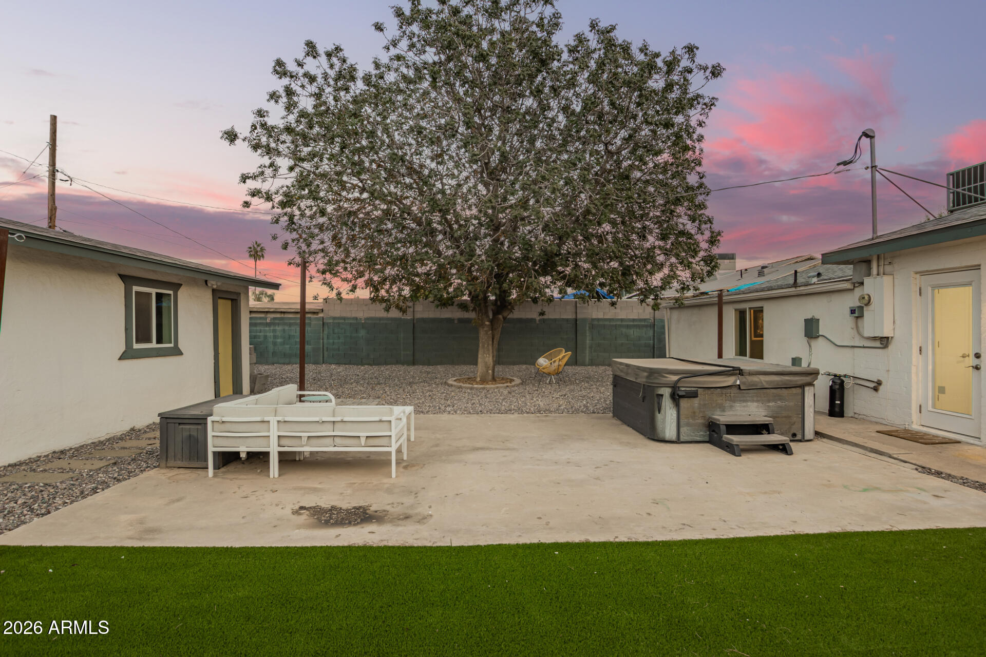 1328 East Weldon Avenue Phoenix, AZ 85014 - Photo 14 of 15 a house view with a sitting space and garden