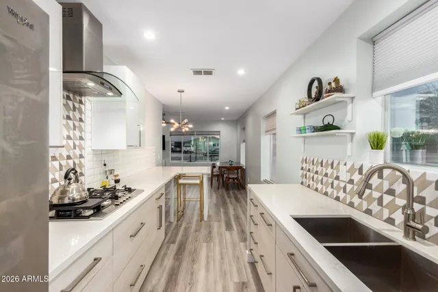 a kitchen with kitchen island granite countertop lots of counter top space