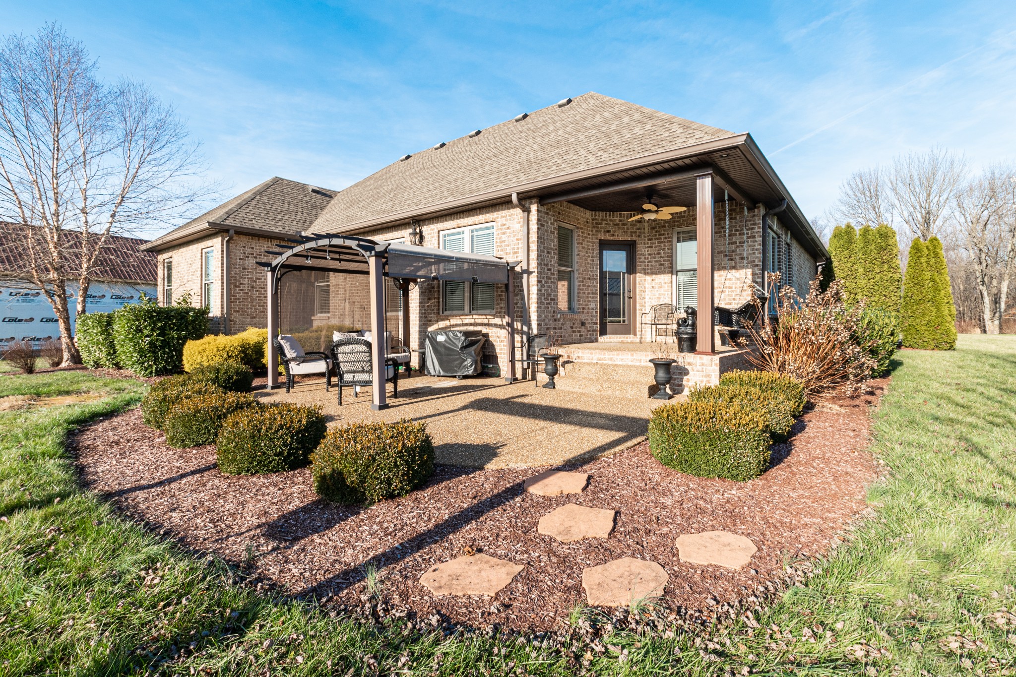 858 Coker Ford Road Portland, TN 37148 - Photo 28 of 30 a view of a chair and tables in the patio