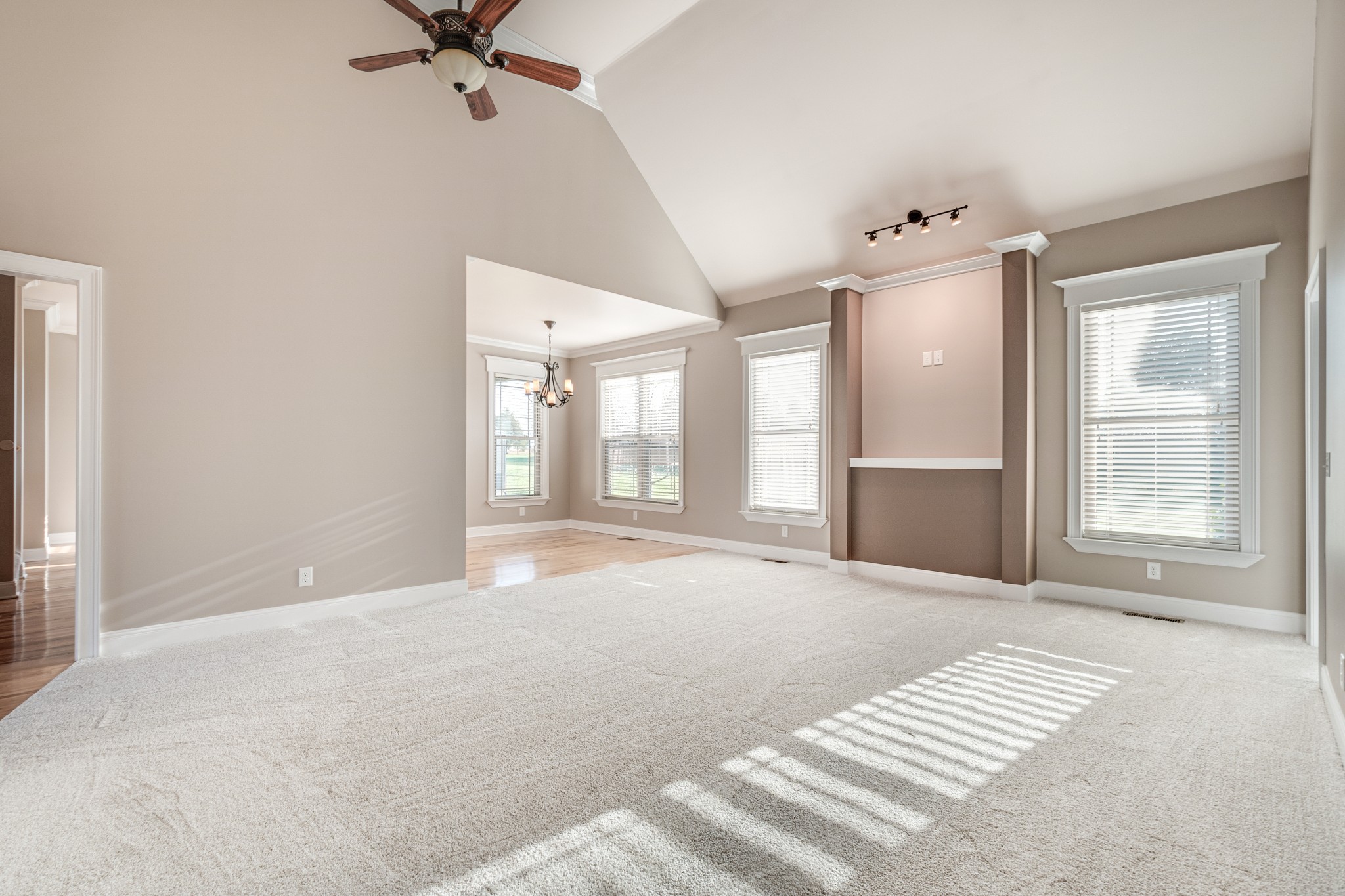 858 Coker Ford Road Portland, TN 37148 - Photo 6 of 30 a view of an empty room with a fireplace and a window