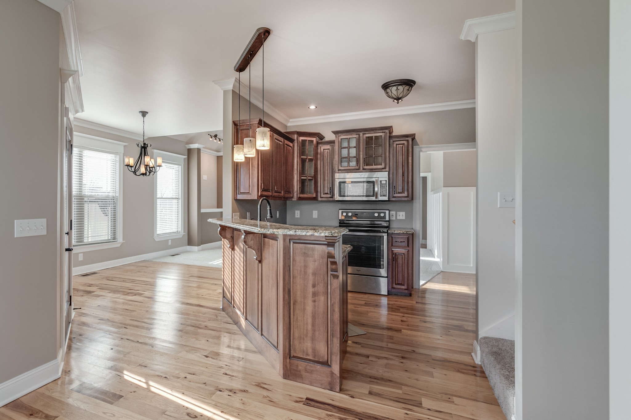 858 Coker Ford Road Portland, TN 37148 - Photo 10 of 30 a kitchen with stainless steel appliances a refrigerator and a stove top oven