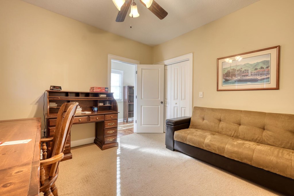 1405 Lakeside Road Hiawassee, GA 30546 - Photo 21 of 37 a living room with furniture and a flat screen tv