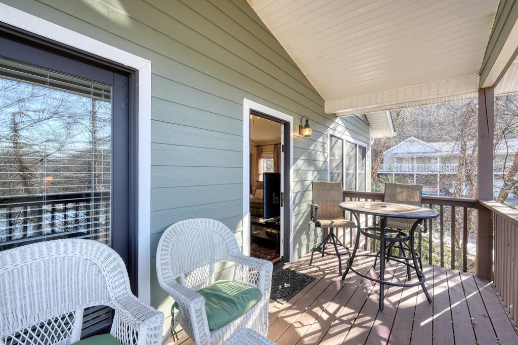 1405 Lakeside Road Hiawassee, GA 30546 - Photo 25 of 37 a view of a dining room with furniture window and outside view