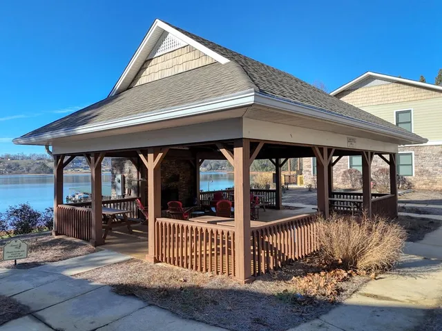 a view of a house with porch and wooden floor