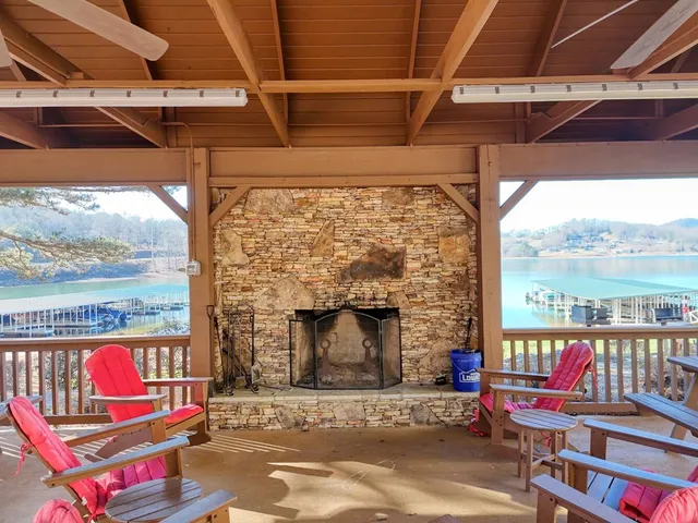 a building outdoor space with patio furniture and potted plants