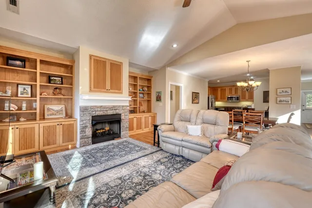 a living room with furniture or fireplace and a flat screen tv