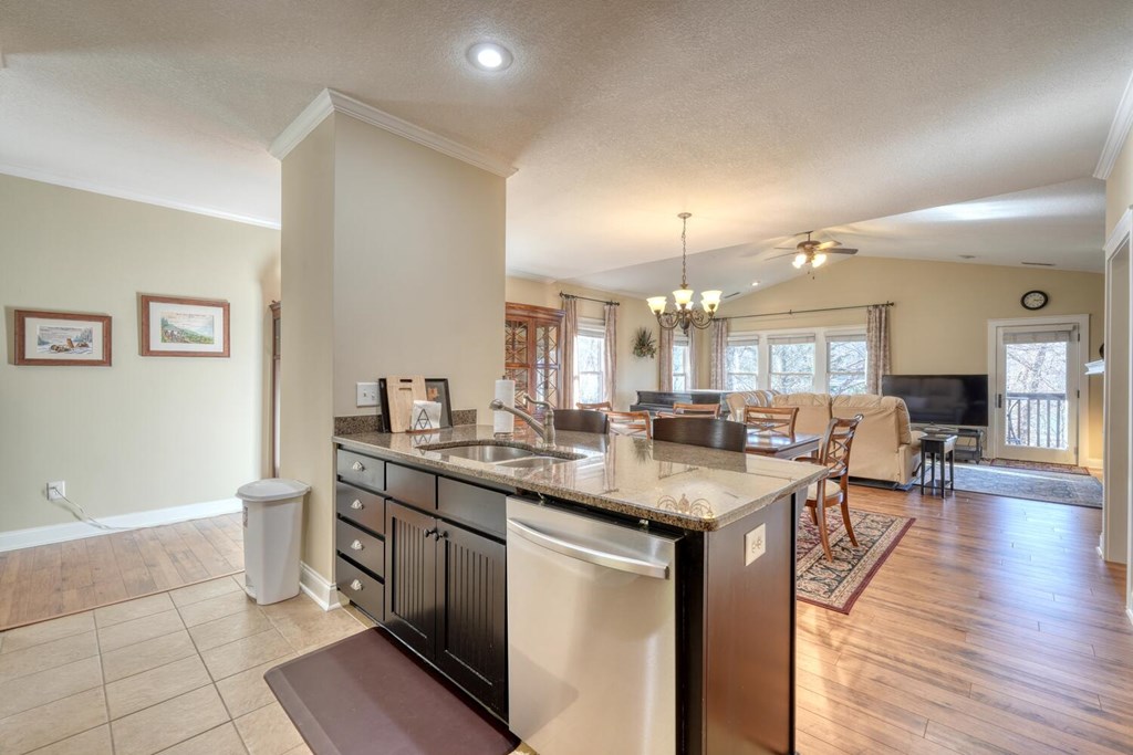 1405 Lakeside Road Hiawassee, GA 30546 - Photo 10 of 37 a kitchen with sink and cabinets