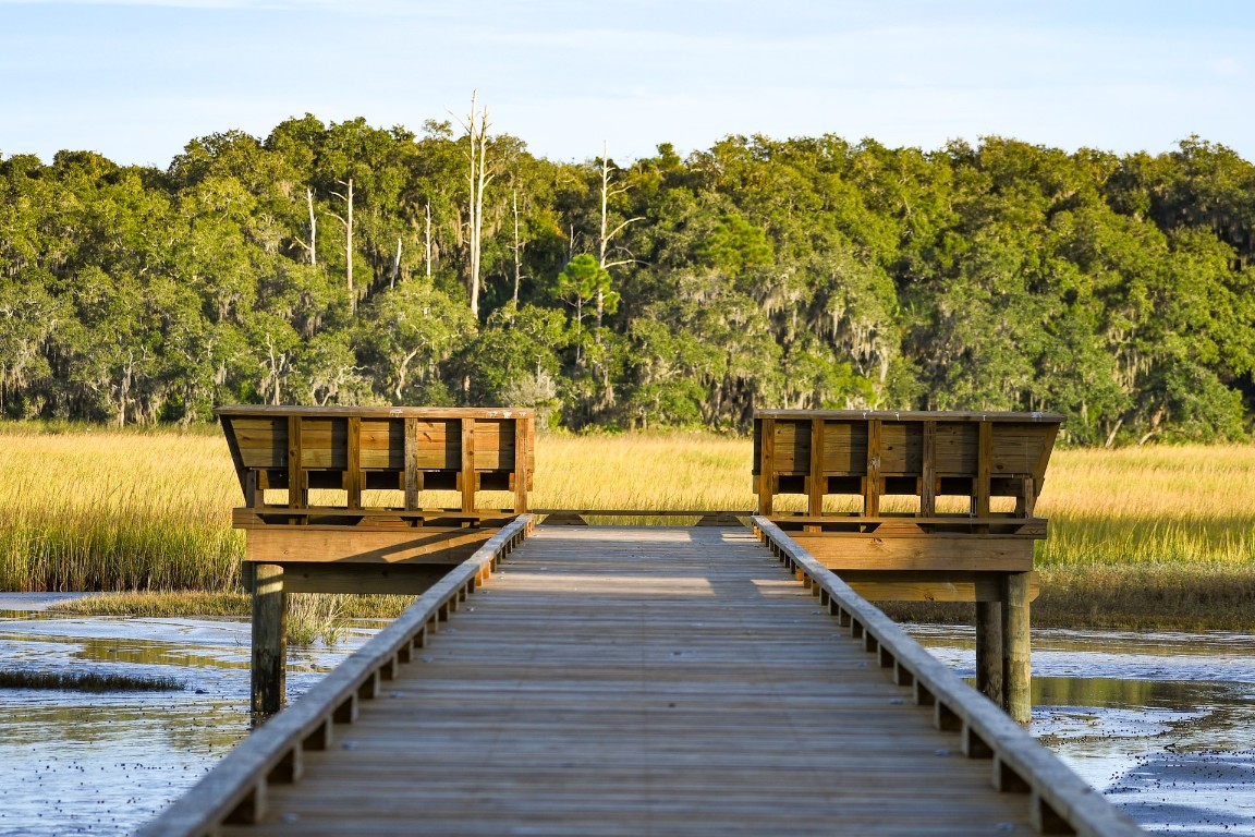 84 Broadbent Way Fernandina Beach, FL 32034 - Photo 11 of 21 a view of a balcony with chairs