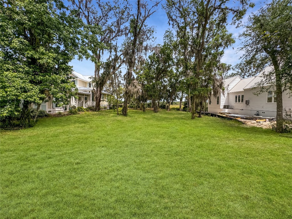 84 Broadbent Way Fernandina Beach, FL 32034 - Photo 19 of 21 a view of a field of grass and trees