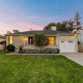 front view of a house with a big yard