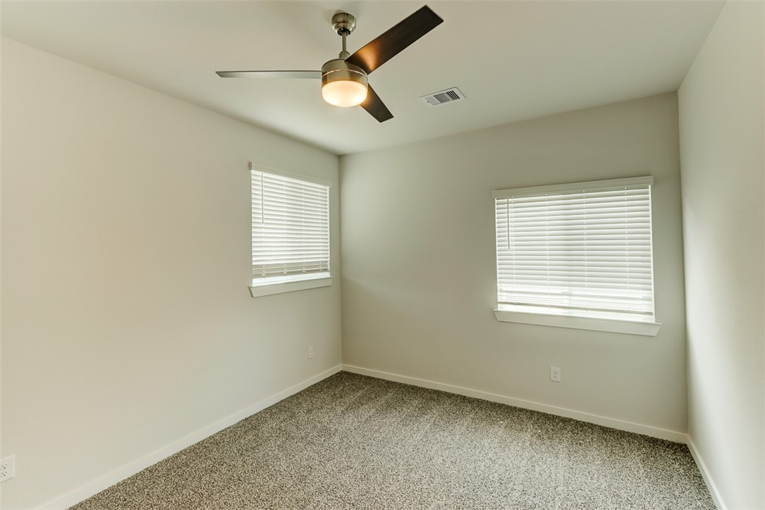760 Double Mountain Road College Station, TX 77845 - Photo 20 of 26 an empty room with a window