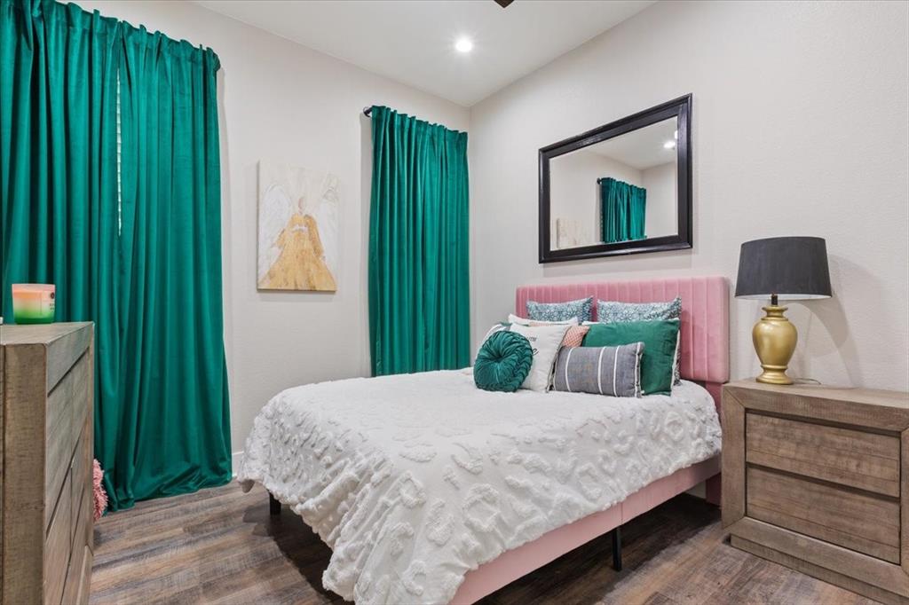 1652 Mt Moriah Road Riesel, TX 76682 - Photo 25 of 39 a bedroom with a bed and a potted plant