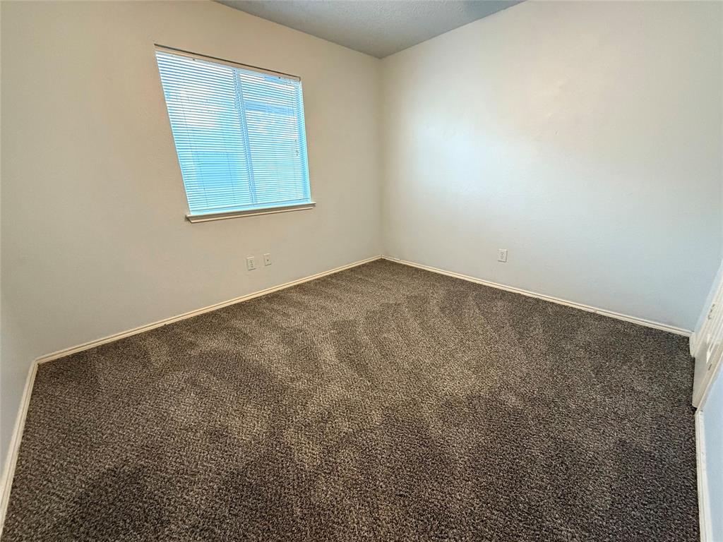 1710 White Oak Road Anna, TX 75409 - Photo 9 of 14 an empty room with a window