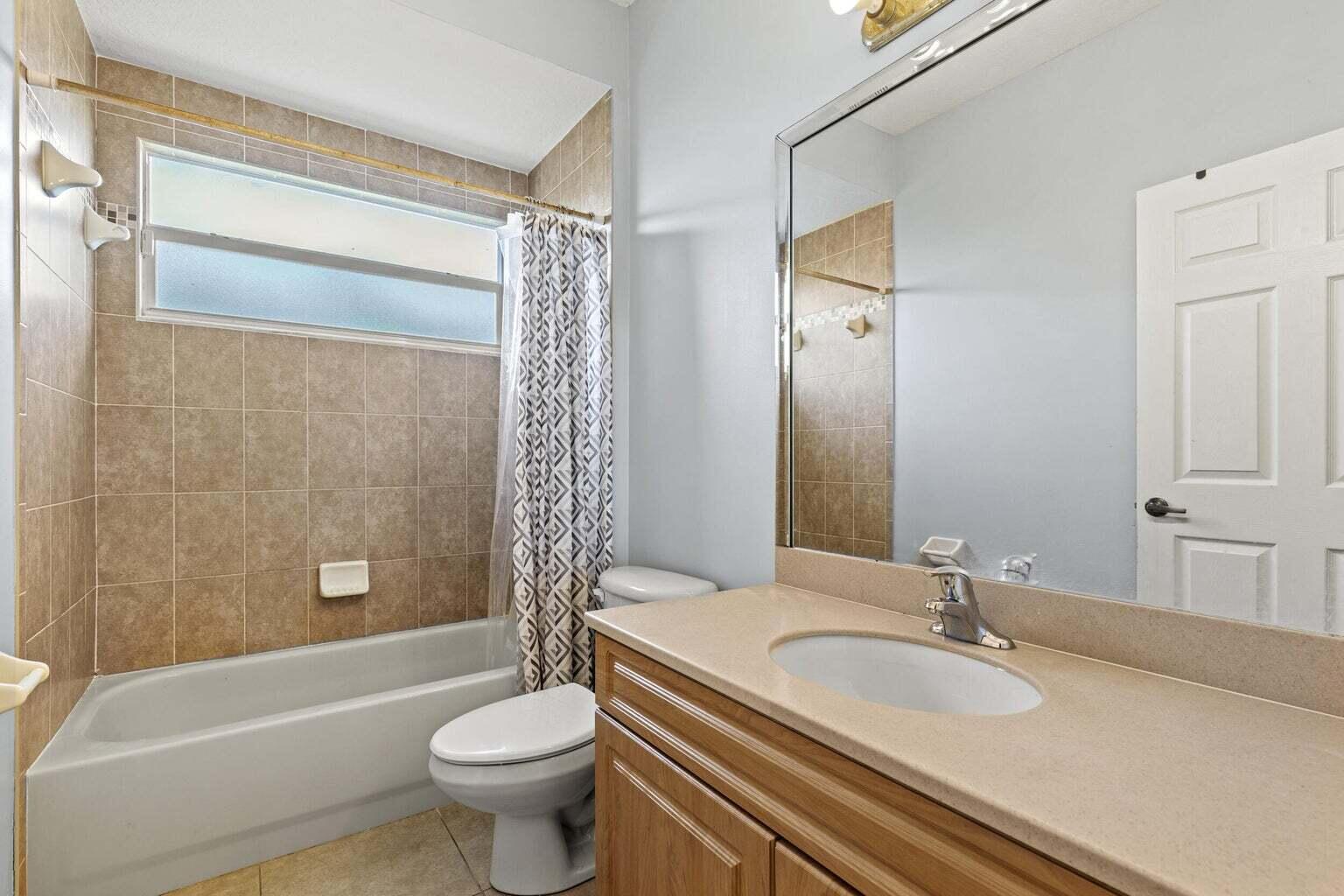 4407 Southwest Wabash Street Port St. Lucie, FL 34953 - Photo 28 of 38 Guest Bathroom 2