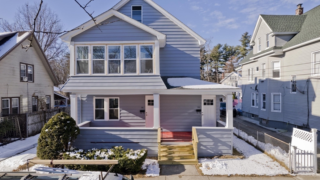34-36 Ruskin Street Springfield, MA 01108 - Photo 1 of 27 a view of a yard in front of house