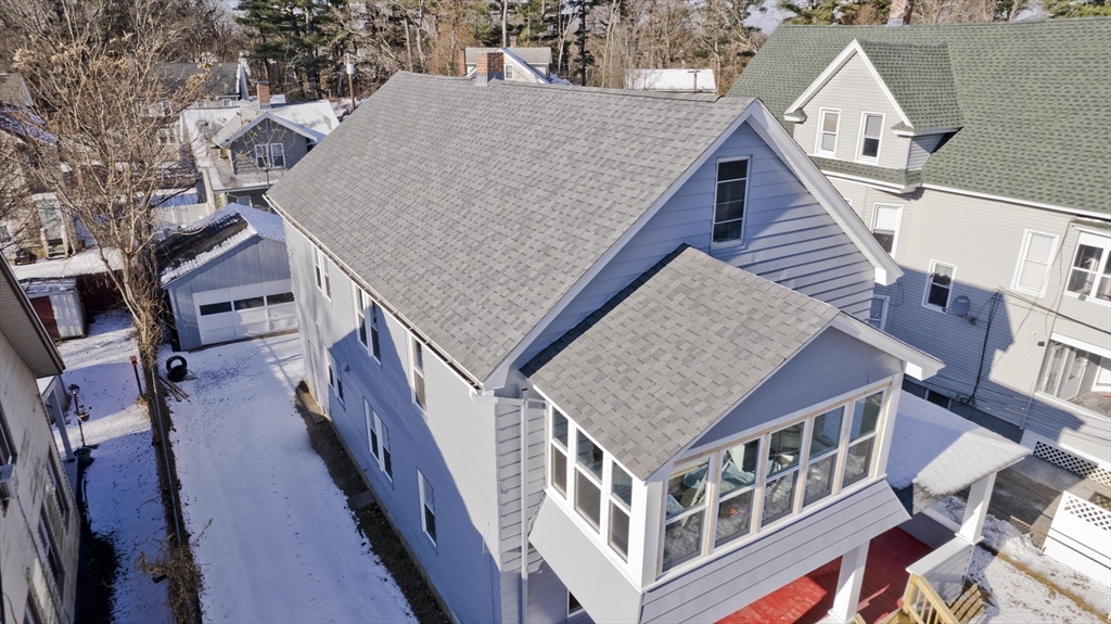 34-36 Ruskin Street Springfield, MA 01108 - Photo 2 of 27 an aerial view of residential houses with wooden fence