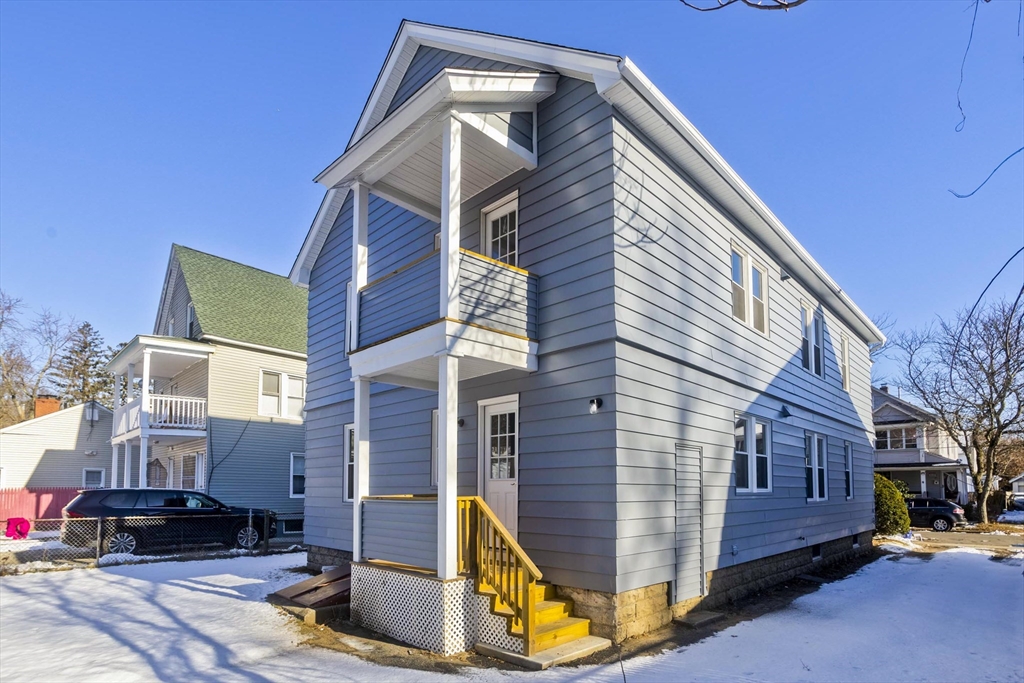34-36 Ruskin Street Springfield, MA 01108 - Photo 22 of 27 a view of a house with a patio