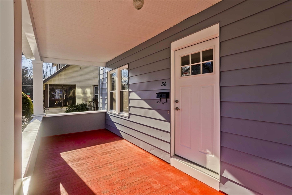 34-36 Ruskin Street Springfield, MA 01108 - Photo 4 of 27 a view of an outdoor space with wooden floor and a window