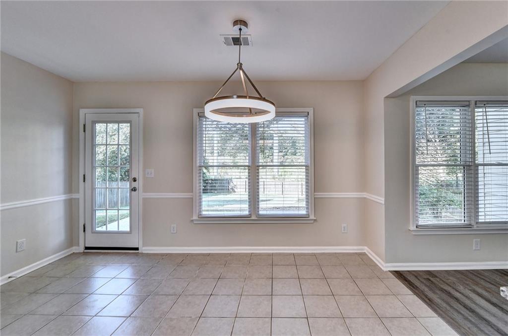 3460 Maple Terrace Drive Suwanee, GA 30024 - Photo 18 of 51 a view of an empty room with a window