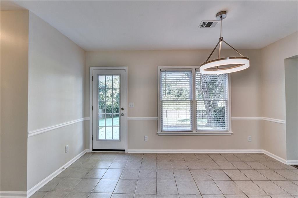 3460 Maple Terrace Drive Suwanee, GA 30024 - Photo 20 of 51 a view of an empty room with a window