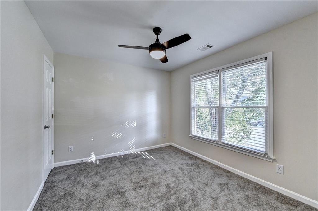 3460 Maple Terrace Drive Suwanee, GA 30024 - Photo 31 of 51 a view of an empty room with a window