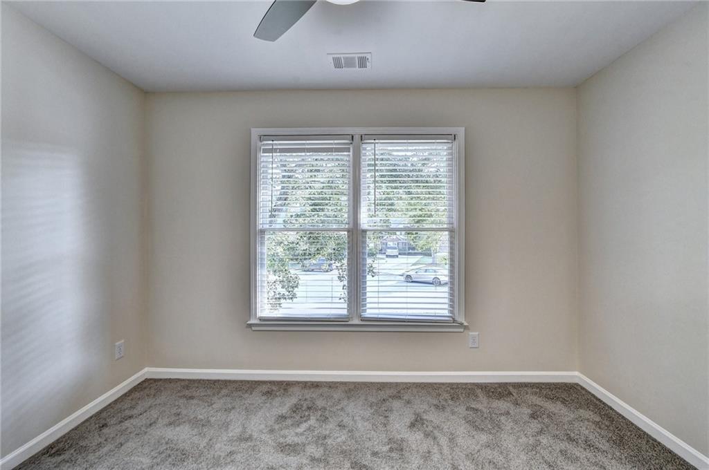 3460 Maple Terrace Drive Suwanee, GA 30024 - Photo 32 of 51 an empty room with a window