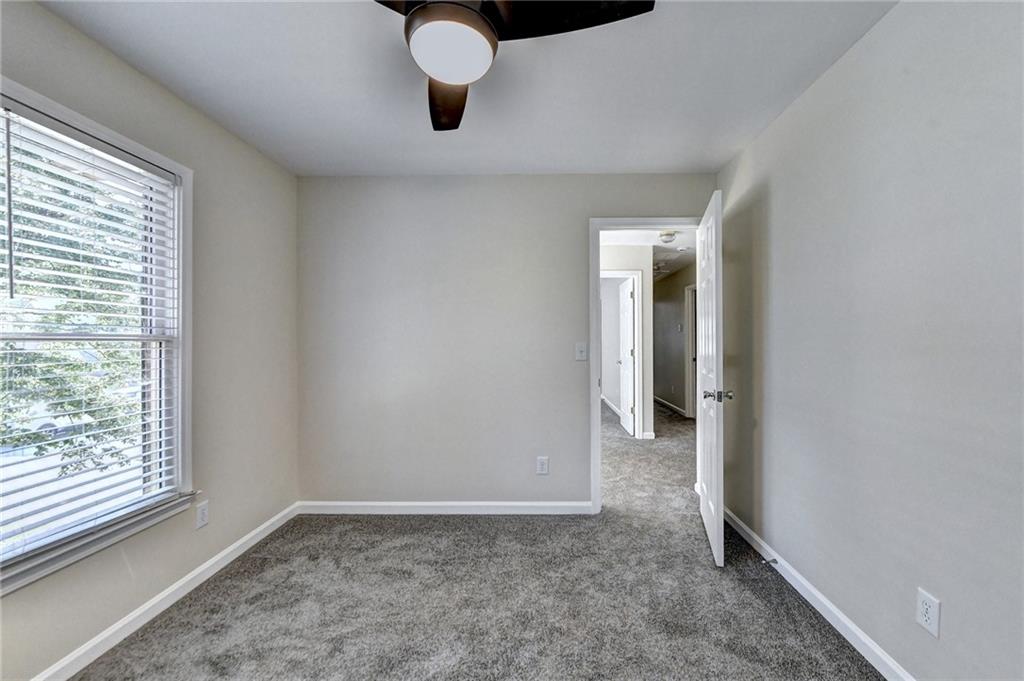 3460 Maple Terrace Drive Suwanee, GA 30024 - Photo 33 of 51 a view of an empty room with a window