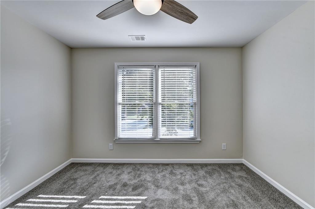 3460 Maple Terrace Drive Suwanee, GA 30024 - Photo 35 of 51 a view of an empty room with a window