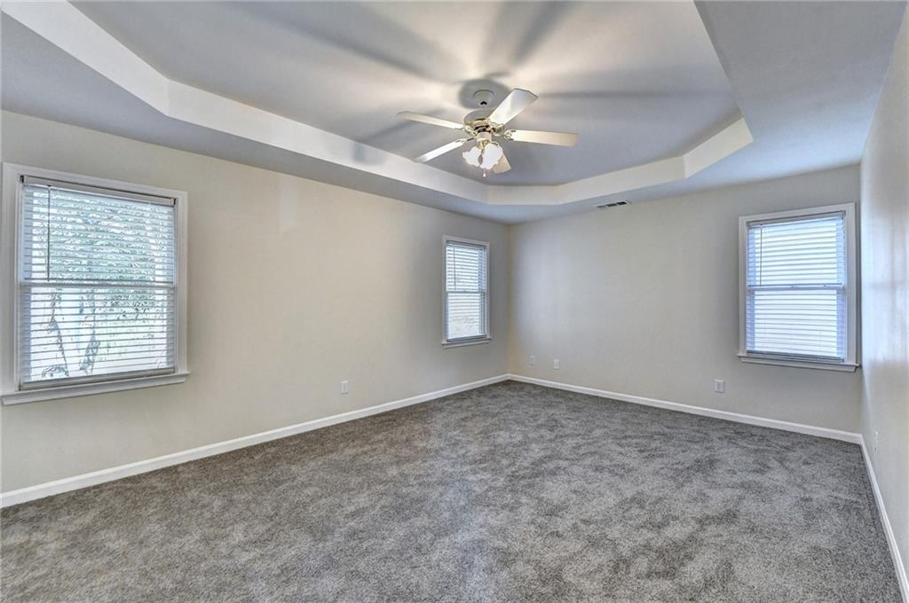 3460 Maple Terrace Drive Suwanee, GA 30024 - Photo 37 of 51 a view of an empty room with a window