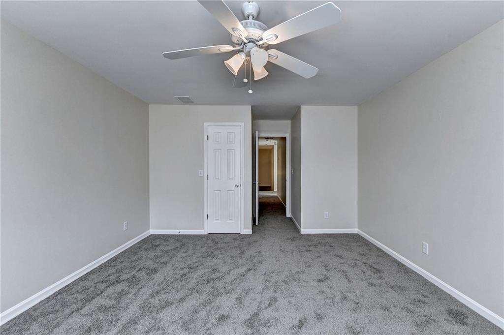 3460 Maple Terrace Drive Suwanee, GA 30024 - Photo 47 of 51 wooden floor in an empty room