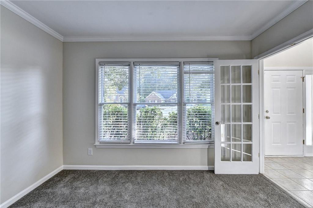 3460 Maple Terrace Drive Suwanee, GA 30024 - Photo 5 of 51 a view of an empty room with a window