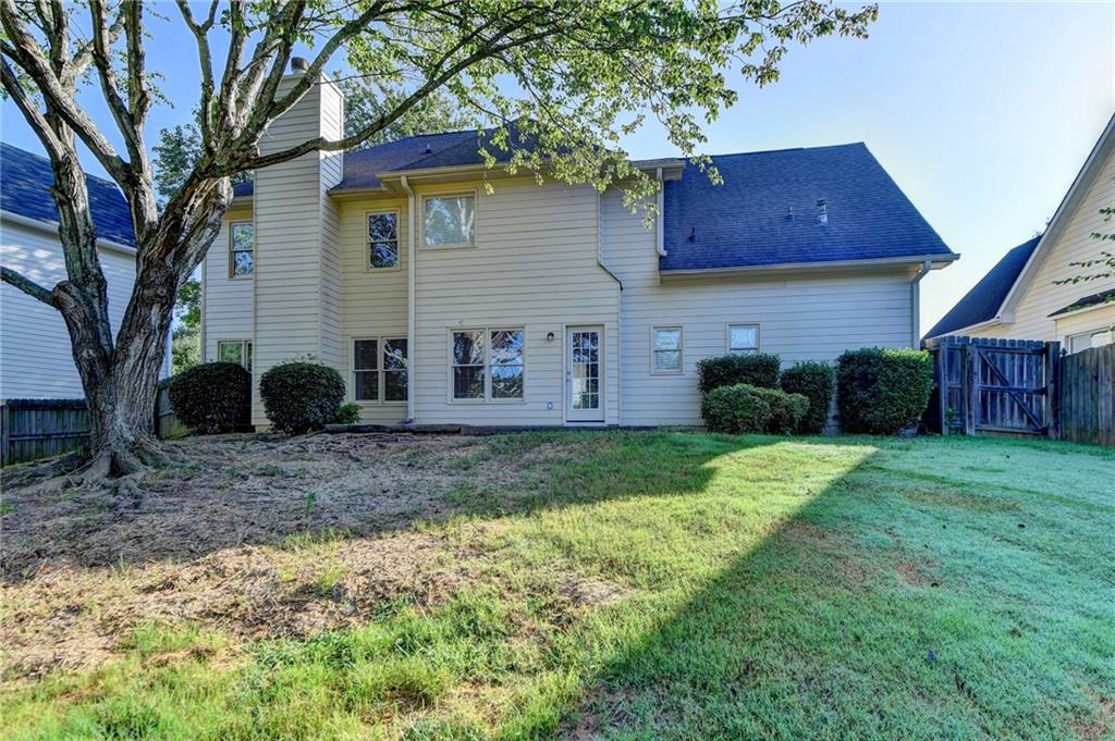 3460 Maple Terrace Drive Suwanee, GA 30024 - Photo 51 of 51 a view of house with yard and entertaining space