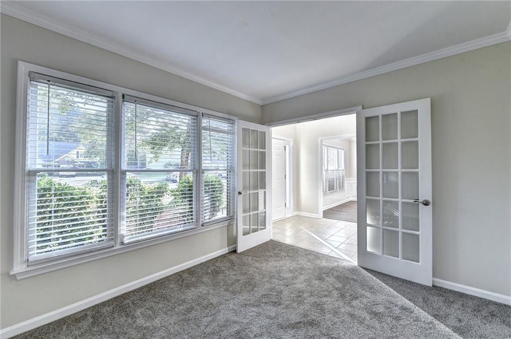 3460 Maple Terrace Drive Suwanee, GA 30024 - Photo 7 of 51 a view of empty room with windows