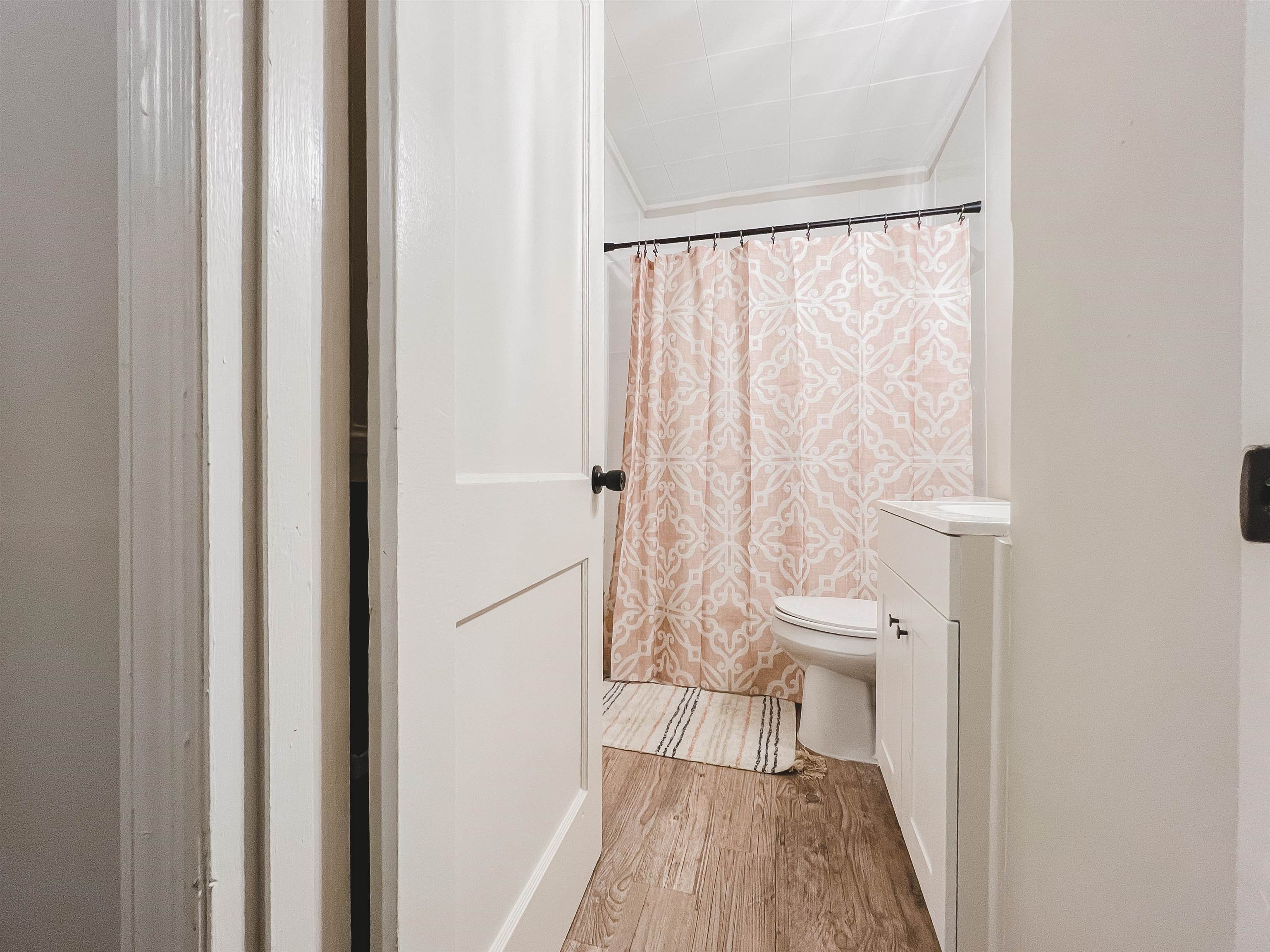 4094 Lawrence Road Memphis, TN 38122 - Photo 14 of 24 a bathroom with a toilet and a shower