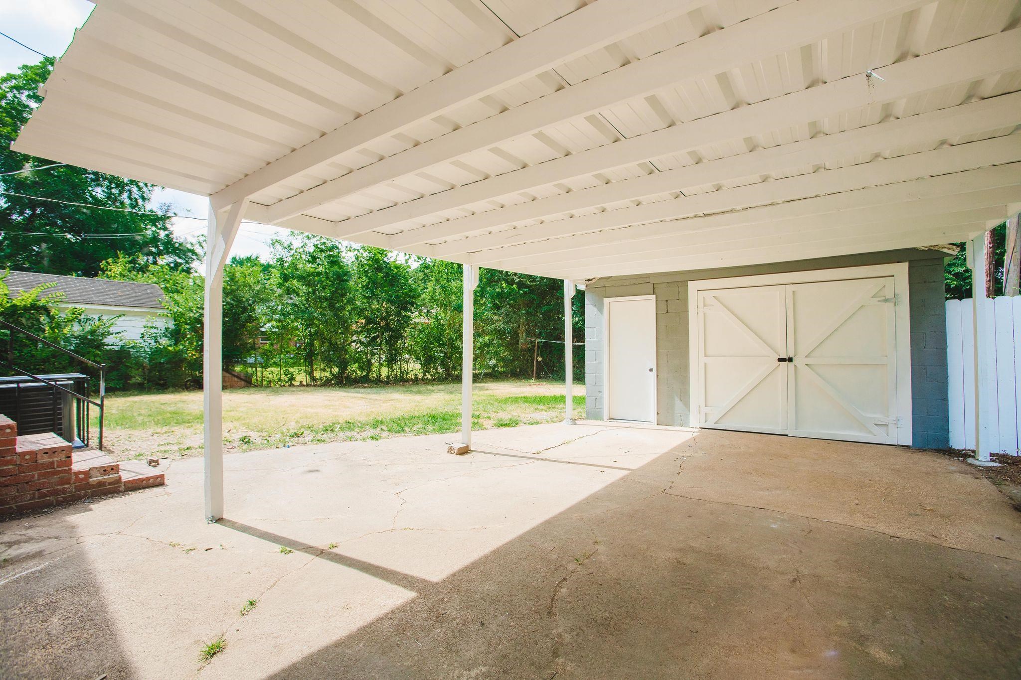 4094 Lawrence Road Memphis, TN 38122 - Photo 22 of 24 a view of a house with backyard and porch