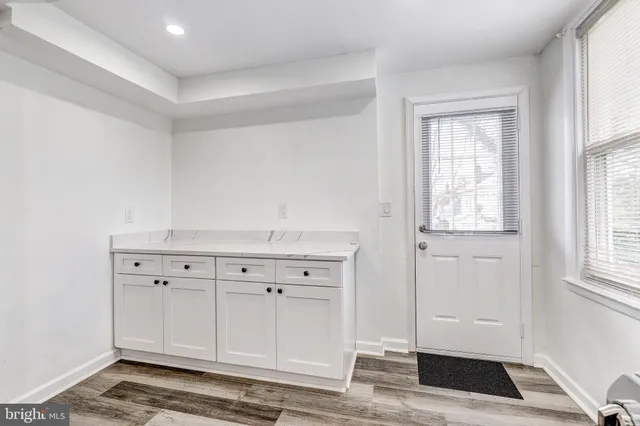 a view of cabinets and window