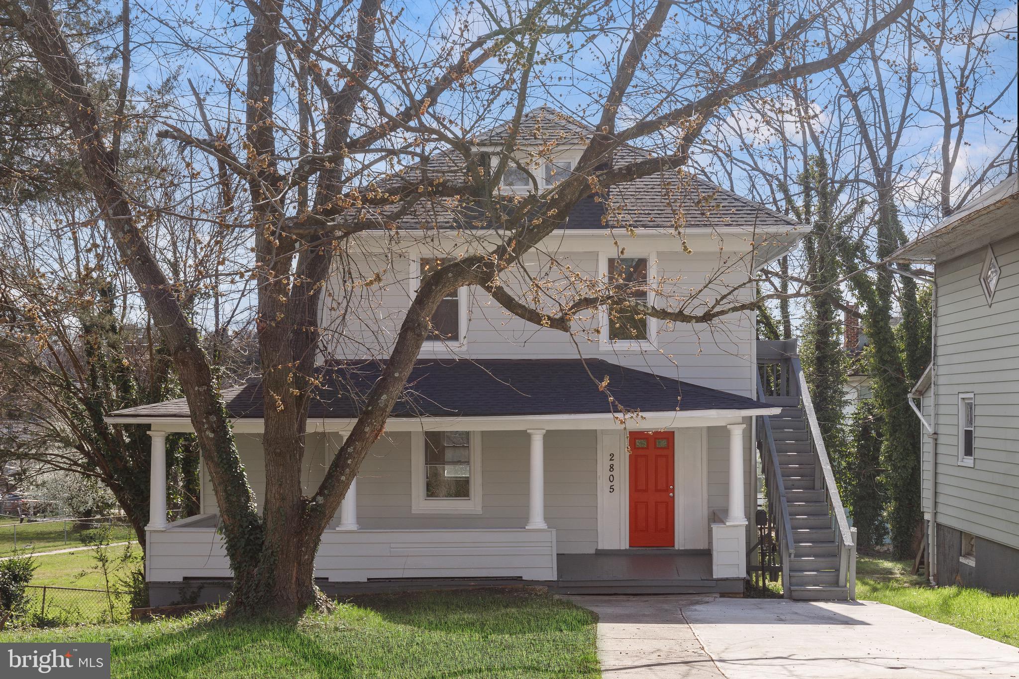 2805 Hamilton Avenue Baltimore, MD 21214 - Photo 4 of 41 front view of a house with a yard
