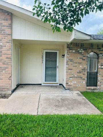 a front view of a house with a garage