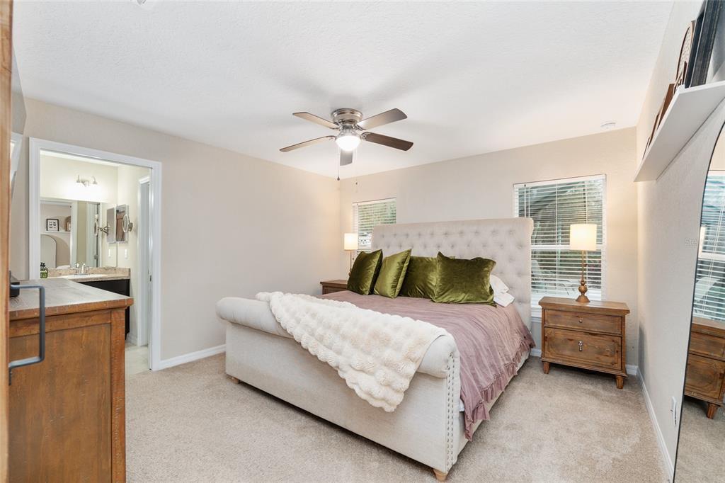 13700 Southwest 71st Lane Ocala, FL 34481 - Photo 31 of 100 a bedroom with a bed and window