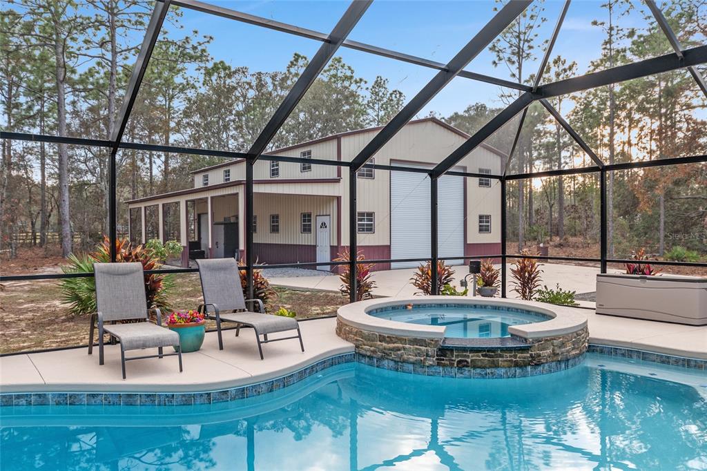 13700 Southwest 71st Lane Ocala, FL 34481 - Photo 64 of 100 a view of a house with swimming pool and sitting area