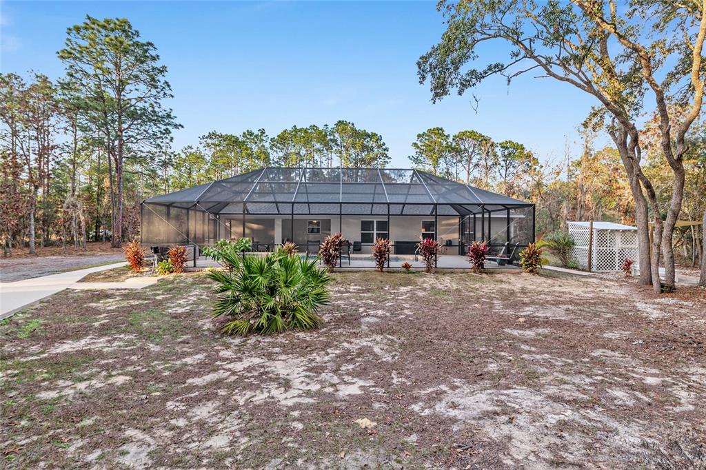 13700 Southwest 71st Lane Ocala, FL 34481 - Photo 77 of 100 a view of a chairs and tables in the patio