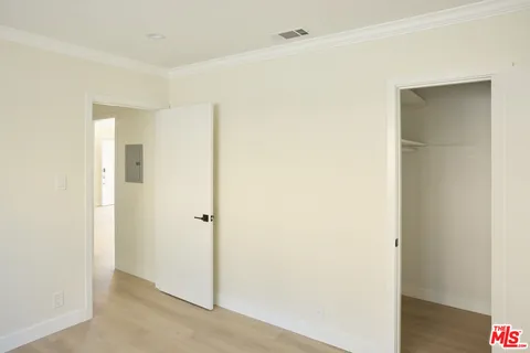 a view of a livingroom with wooden floor