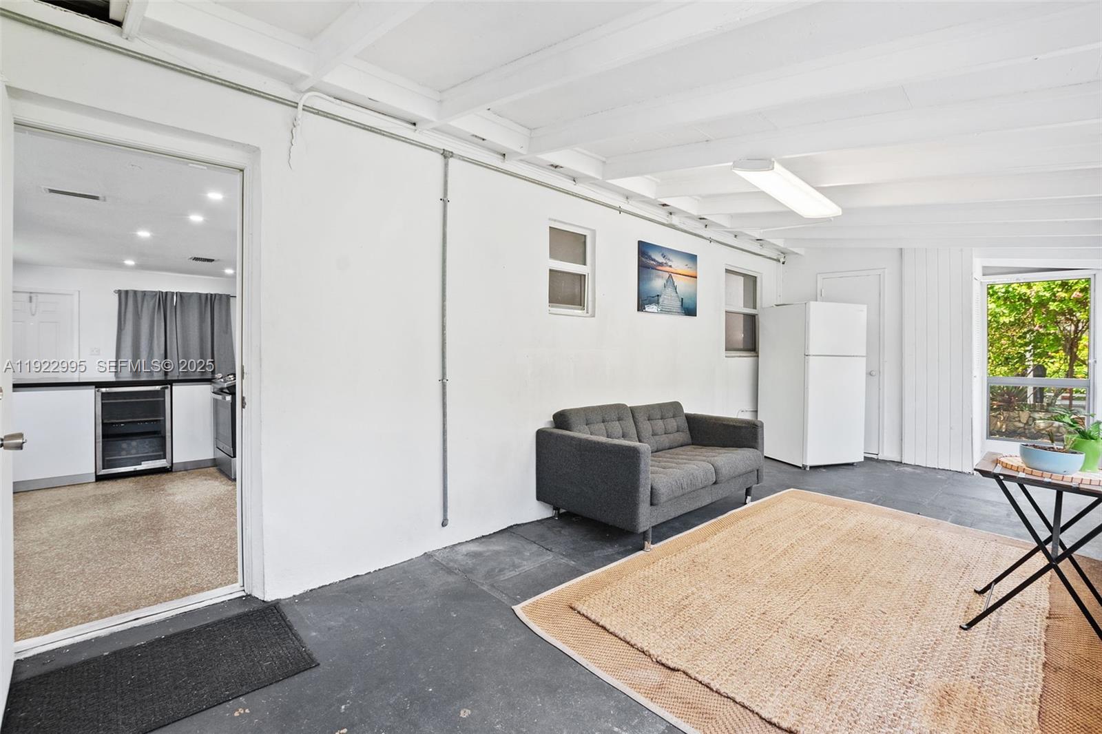 3711 Southwest 58th Avenue Davie, FL 33314 - Photo 32 of 40 a bedroom with furniture and a window