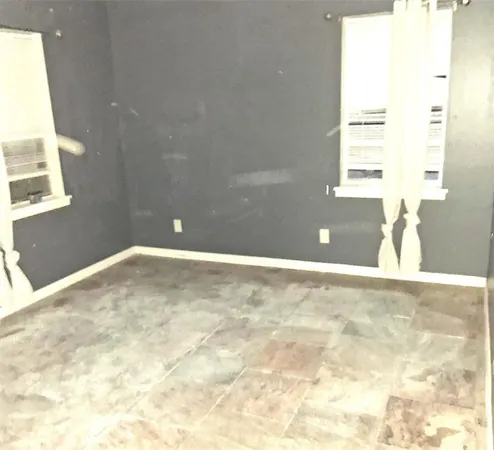 a view of a window in an empty room