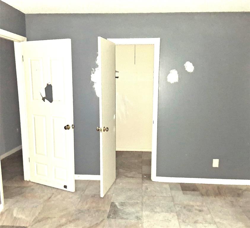 135 Akins Road Texarkana, TX 75501 - Photo 9 of 12 a view of a hallway with two windows