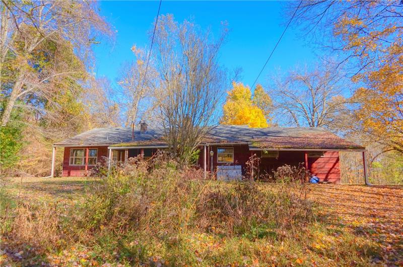 540 Mercer Road Butler, PA 16001 - Photo 2 of 14 This home has a small basement area which houses the furnace/hot water tank.