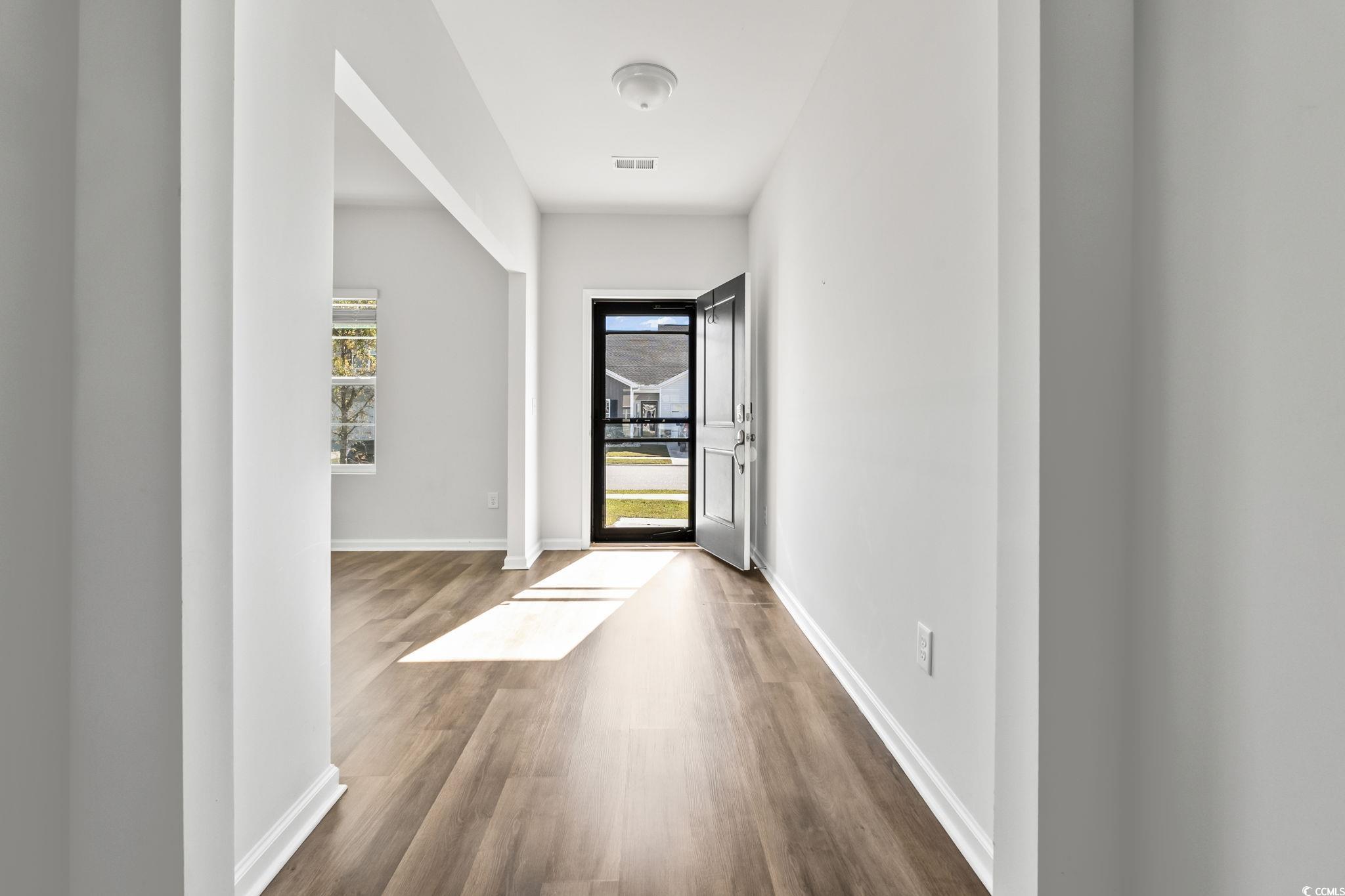 733 Lambeth Lane Conway, SC 29526 - Photo 2 of 40 Doorway with wood finished floors and baseboards