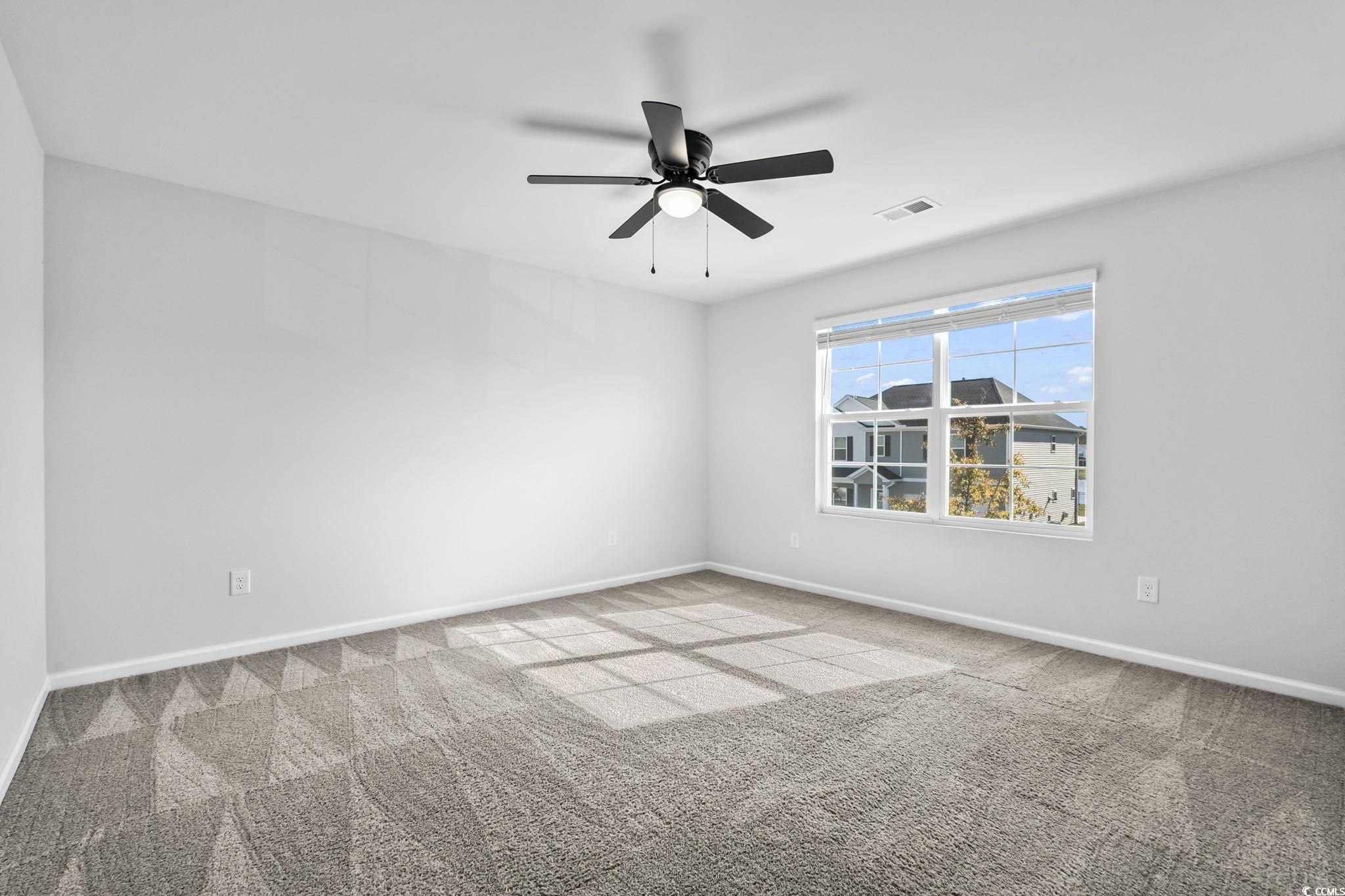 733 Lambeth Lane Conway, SC 29526 - Photo 22 of 40 Unfurnished room with light colored carpet and ceiling fan